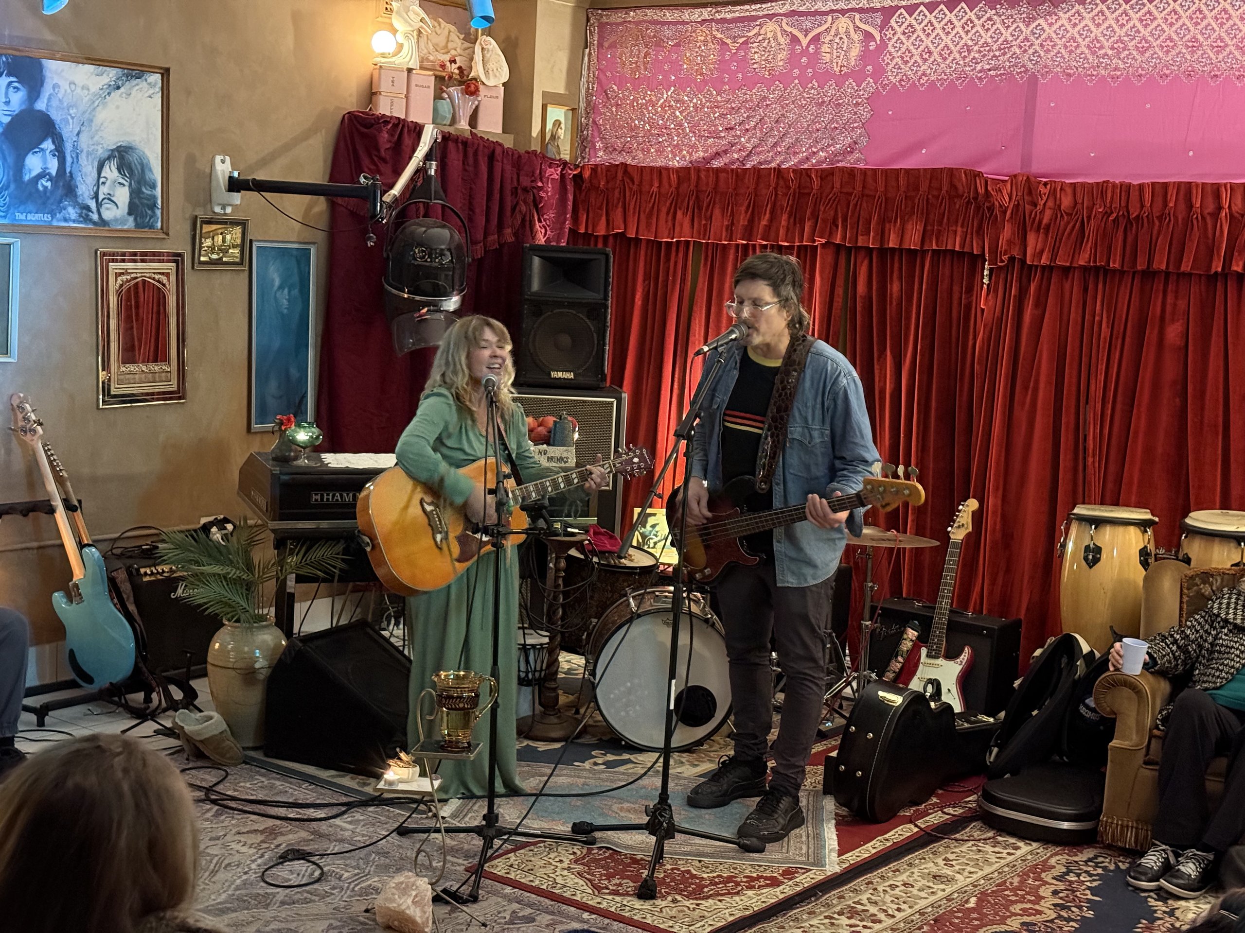 Acoustic duo performing with guitars on the velvet stage beside the Hammond organ at Joy's on the Avenue in Salisbury, Brisbane
