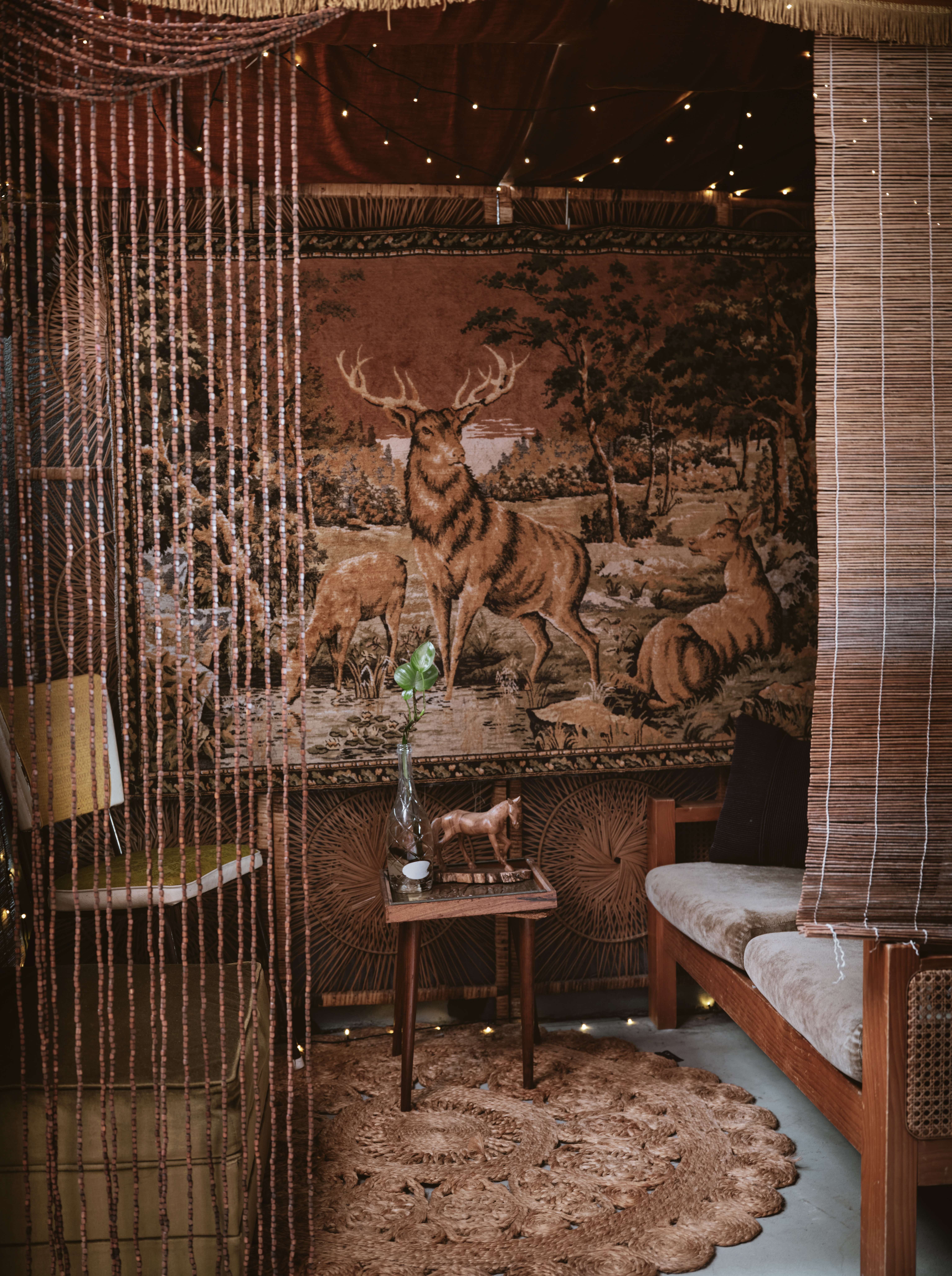 The copper-front bar with espresso machine and bullfighter cabinet