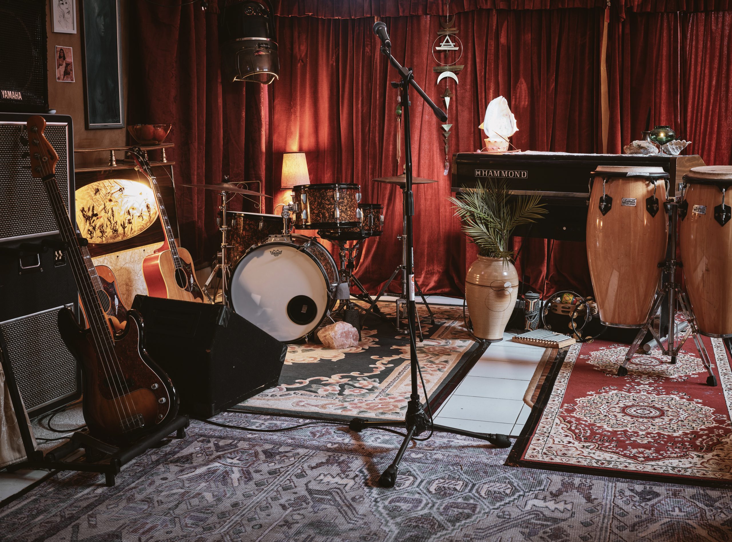 Velvet stage with Hammond organ and drum kit, a music rehearsal and performance space at Joy's on the Avenue